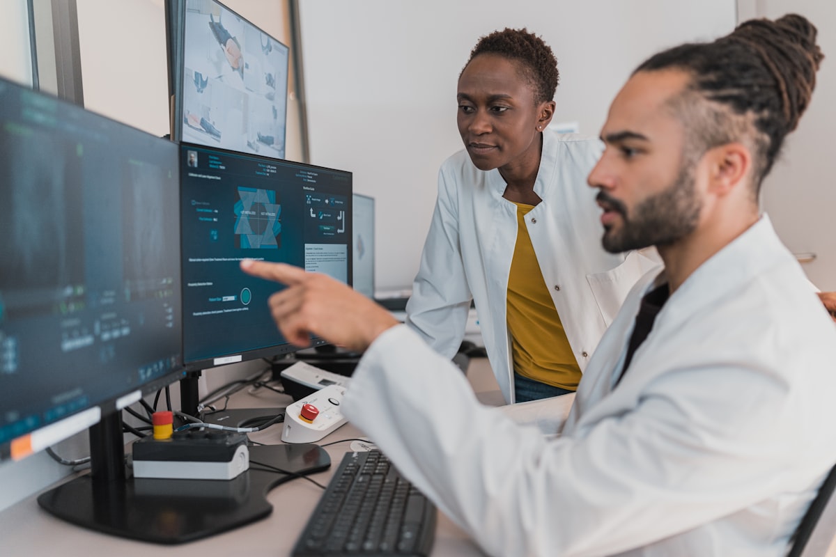 Specialists reviewing imaging together at a workstation